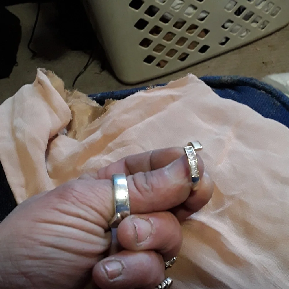 Sleek Silver Ring with Transparent Component and Internal Mechanism